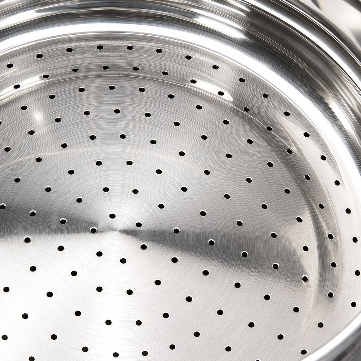 Perforated upper container of the stainless steel couscous steamer